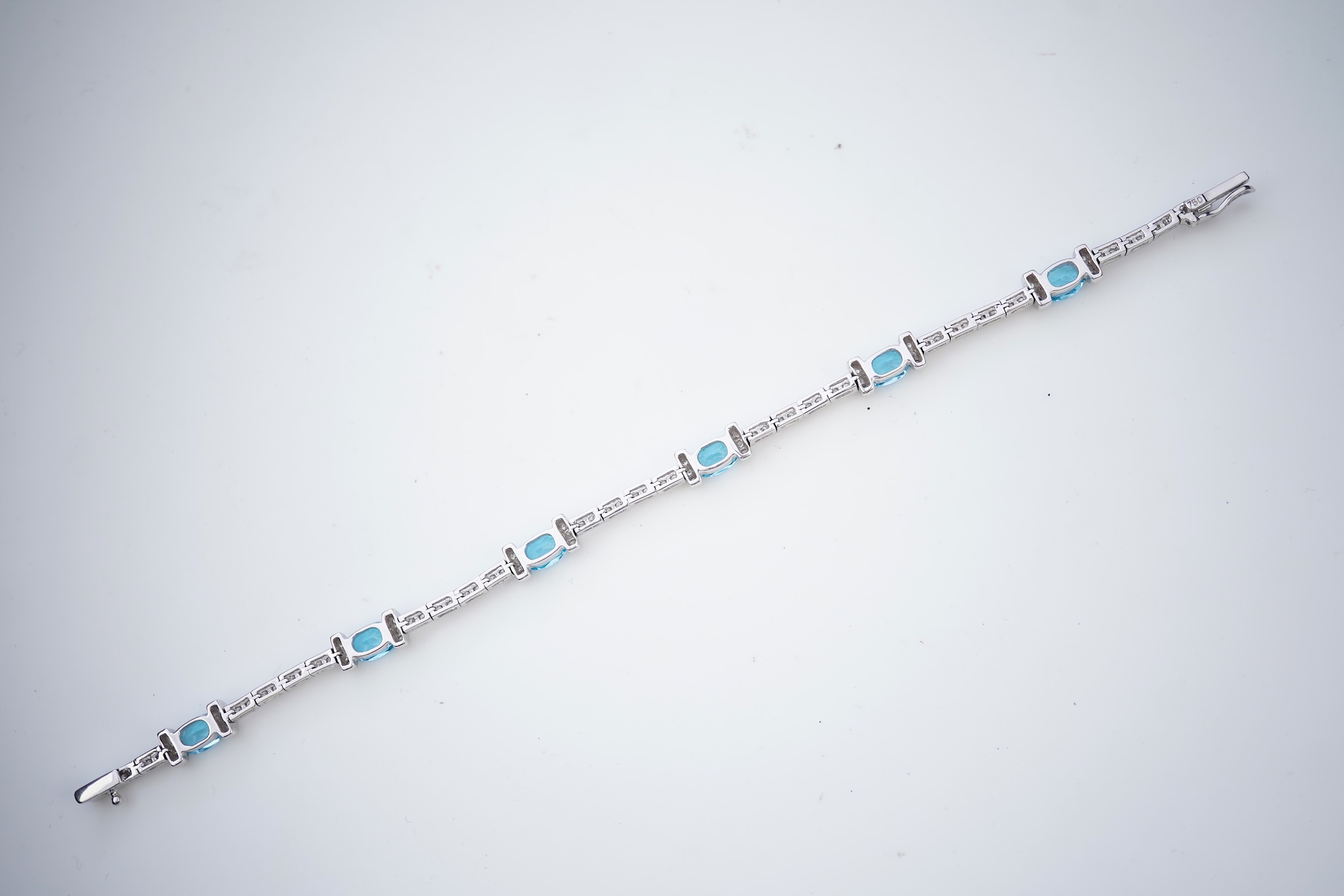 A blue topaz and diamond bracelet